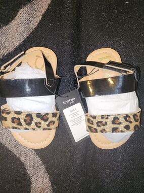 Bebe Animal Print Flat Sandals Black & Tan US 6 and 7 NWT